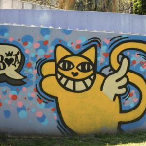 Graffiti de M Chat dans les rues de Lisbonne
