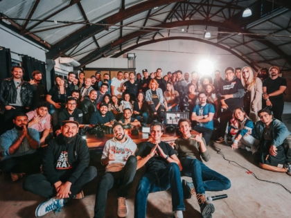 photo of people smiling and posing for a picture