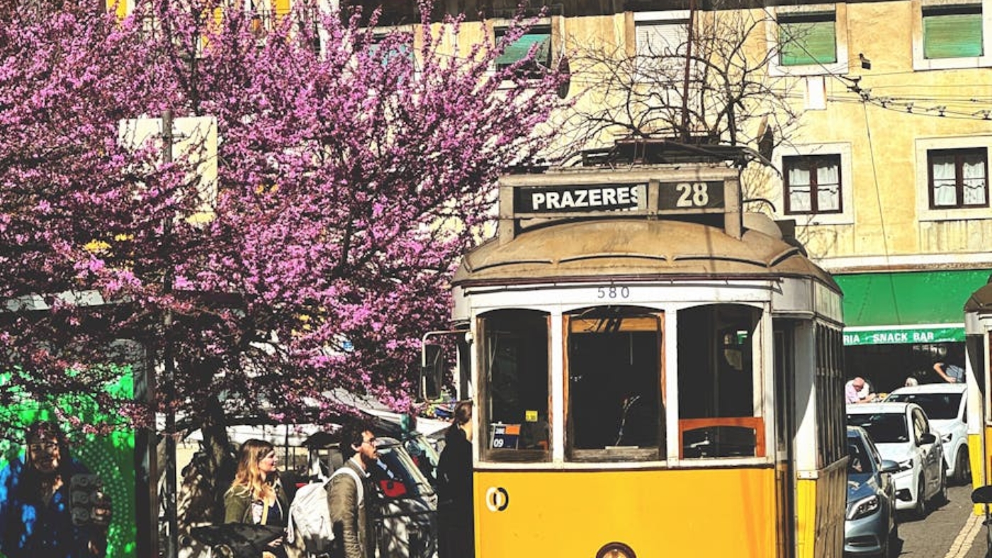 iconic yellow tram in lisbon s alfama district