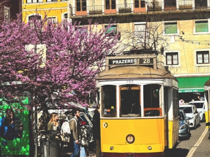 iconic yellow tram in lisbon s alfama district