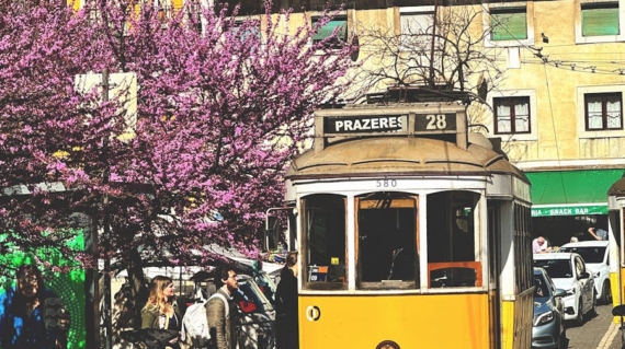 iconic yellow tram in lisbon s alfama district
